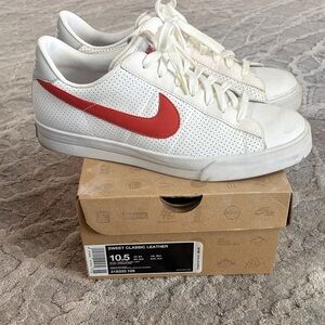 Nike Men’s Classic Leather Sneakers in White with Orange Swoosh